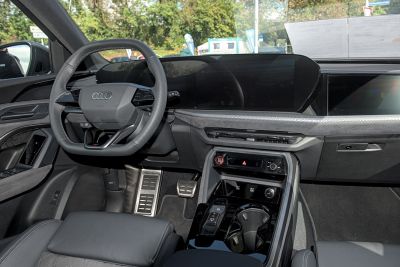 Digital dashboard and multifunction steering wheel in luxury SUV interior