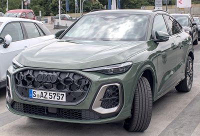 SUV front with bold hexagonal grille and slim LED headlights