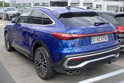 Sleek rear design with taillights and dual exhausts