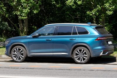 Side profile of SUV with alloy wheels and tinted windows