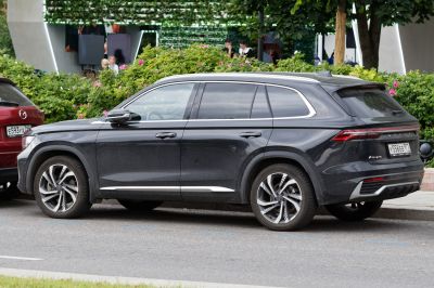 Black SUV with alloy wheels and tinted windows