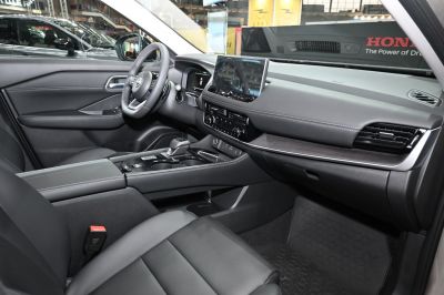Modern car interior with touchscreen and leather seats