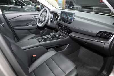 Digital dashboard and large touch screen infotainment with leather seats.