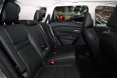 Black leather rear seats with headrests and seatbelts