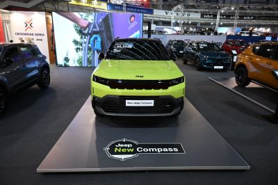 Front view of modern SUV with prominent LED grille and bold styling