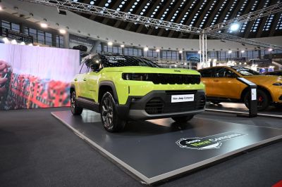 Bold black front grille and boxy rugged SUV design