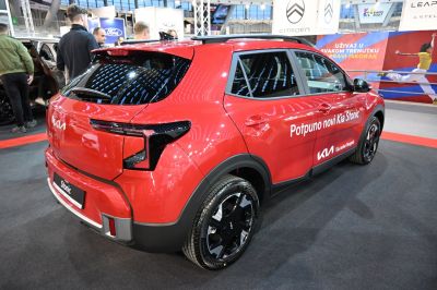 Rear and side view of red compact SUV with modern tail lights and alloy wheels