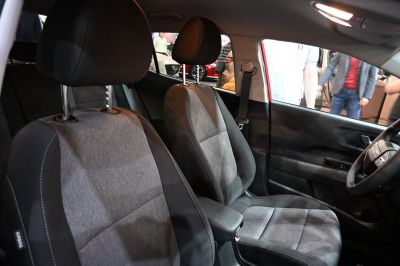 Ergonomic front seats with fabric upholstery inside a compact SUV