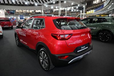 Rear and side view of red compact SUV with modern taillights and alloy wheels