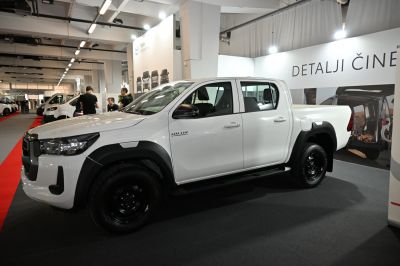 Double cab pickup with black wheel arches and robust front grille