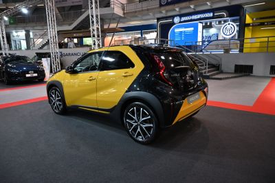 Rear side view with two-tone paint and alloy wheels