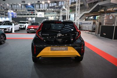 Rear view of hatchback with unique taillights and hybrid badge