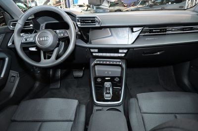 Modern interior dashboard and steering wheel with digital displays