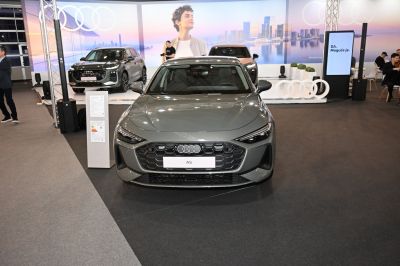 Front view with honeycomb grille and sharp LED headlights