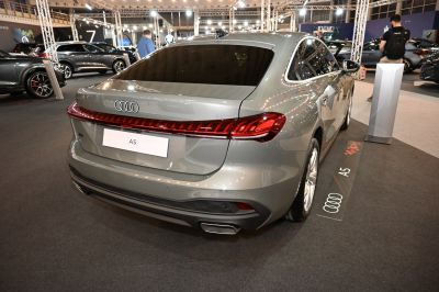 Rear view with full-width LED taillight and dual exhaust tip
