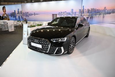 Luxury sedan with distinctive front grille and LED headlights