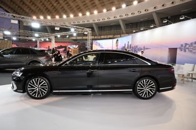 Luxury sedan with alloy wheels and extended wheelbase in black