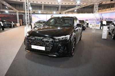 Black luxury SUV with distinctive honeycomb grille and LED headlights