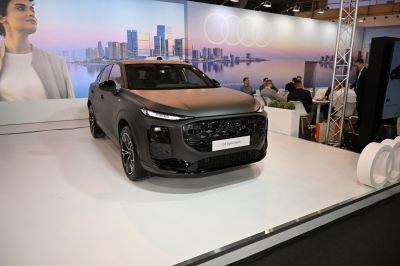 Front view with LED headlights and bold grille design