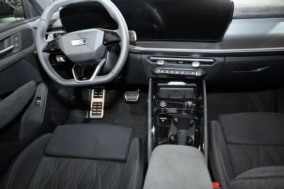 Modern digital cockpit and sleek center console with advanced controls.
