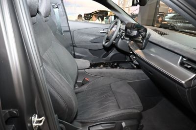 Digital dashboard and front seat upholstery in modern vehicle interior