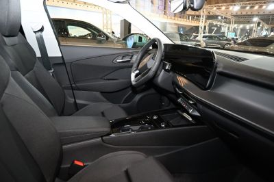 Digital dashboard and sleek interior cabin with modern steering wheel and center console.