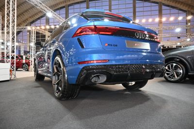 Close-up of rear taillights and dual exhaust with diffuser