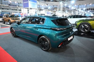 Rear view of hatchback with black alloy wheels and tinted windows