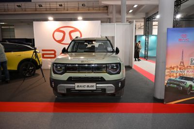 Front view of SUV with LED headlights and bold grille