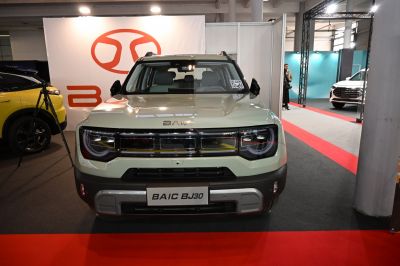 Front view with distinctive grille and modern headlight design