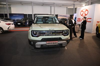 Front view of an SUV with LED headlights and rugged design.