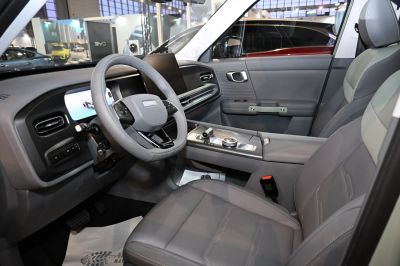 Modern SUV interior with digital dashboard and multifunction steering wheel