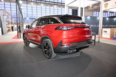 Rear SUV view with LED tail lights and quad exhaust pipes