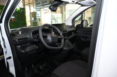 Fiat Doblo III 2022 interior with steering wheel and digital dashboard