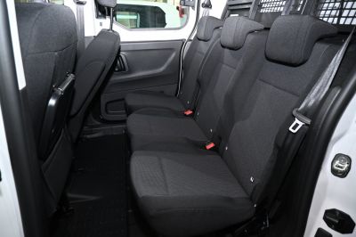 Black fabric rear seats with three headrests inside vehicle