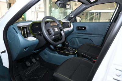 Digital dashboard, manual transmission, dual screens, blue interior trim