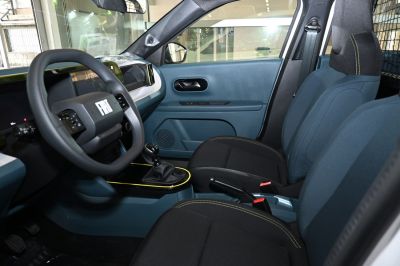 Modern dashboard and seating with manual transmission gear shift