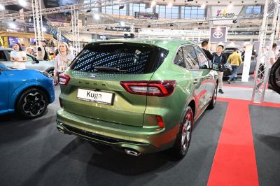 Rear view of SUV with vertical tail lights and dual exhaust outlets