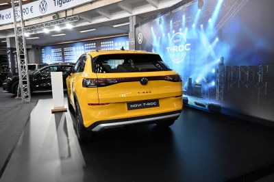 Yellow SUV rear with sleek taillights and Volkswagen emblem