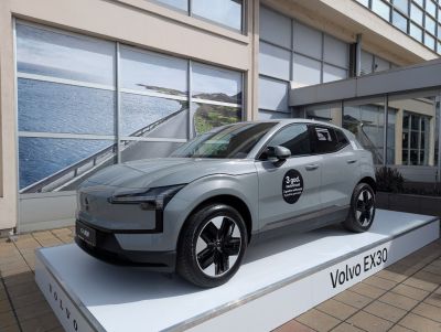 Front-side view of a sleek compact electric SUV with aerodynamic body and modern wheels.