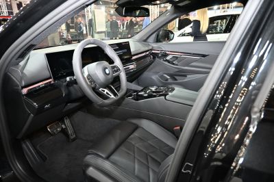 Modern luxury interior with digital displays and premium leather upholstery
