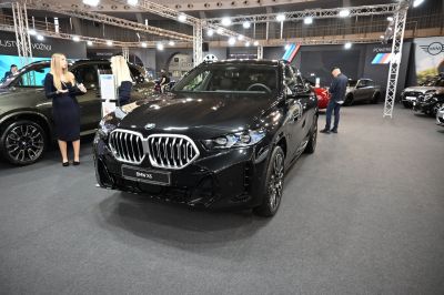 Front view with large kidney grille and LED headlights.