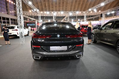 Rear view with taillights and exhausts of a luxury SUV