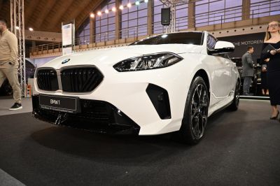 Front view of hatchback with black grille and LED headlights