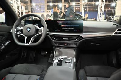 Modern car interior with digital dashboard and multifunction steering wheel