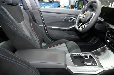 Modern car interior with multifunction steering wheel and control panel