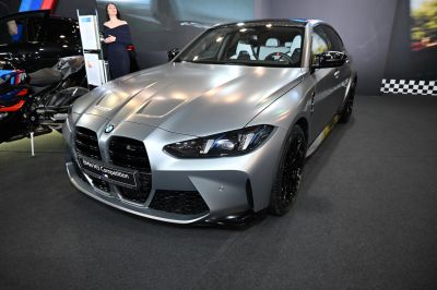 Front view of aggressive grille and sleek headlights