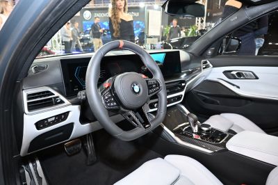 BMW interior with carbon fiber trim and dual digital displays