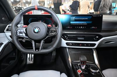 Sport steering wheel and digital dashboard with carbon fiber details