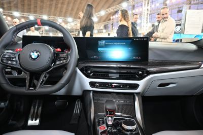 Carbon fiber dashboard with digital display and sporty steering wheel